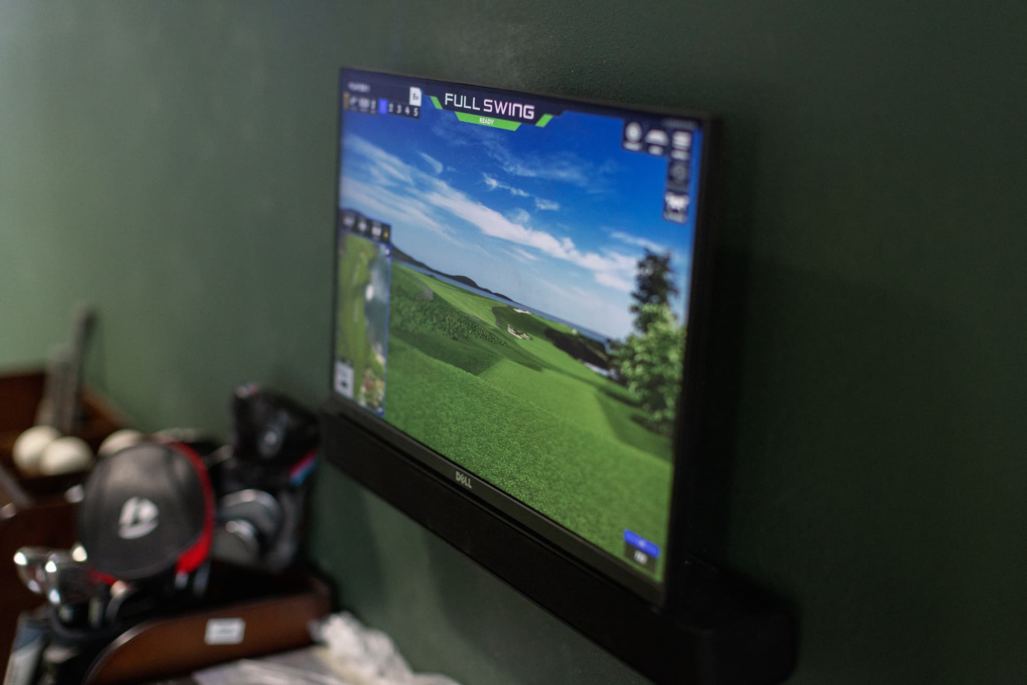 full swing simulator screen on a championship course